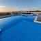 Отель Grand Fifty Suites