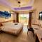 Отель Luau Beach Inn Maldives