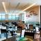 Отель Aloft Dalian