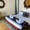 Отель Aurora Boutique Hotel Jambiani
