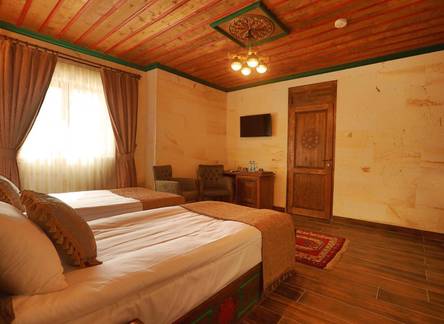 Отель Ada Cave Suites