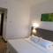 Отель Crown Regency Serviced Suites
