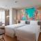Отель Beachwalk Residence