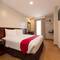 Отель MJ Hotel and Suites