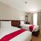 Отель MJ Hotel and Suites