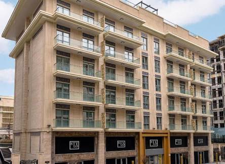 Отель Stylo Residences & Suites