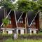 Отель Kanhara Villas by Pramana Villas
