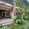 Отель The Mudru Resort by Pramana Villas