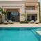Отель Naama Beach Villas & Spa