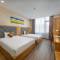 Отель Grand Sunrise Boutique Hotel