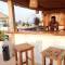 Отель Aluna Beach Apartments
