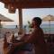 Отель Aluna Beach Apartments