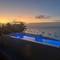 Отель Aluna Beach Apartments