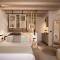 Отель Manili Boutique Suites & Villas