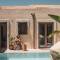 Отель Manili Boutique Suites & Villas