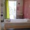 Отель Cleo Rooms