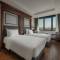 Отель The Q Boutique Hotel