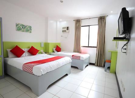 Отель OYO 210 Apple Tree Suites