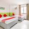 Отель OYO 210 Apple Tree Suites