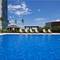 Отель Quest Serviced Residences