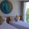 Отель Stone Beach Club Dhiffushi