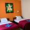 Отель Taxa Uma Guest House