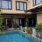 Отель Taxa Uma Guest House