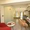 Отель Fiore Garden Suites
