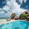 Отель Mambo Beach Villas