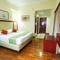 Отель Grand Menteng