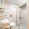 Отель Ren Plus Suites