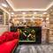 Отель Ren Plus Suites