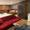 Отель 216 Hill Suites