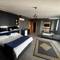 Отель 216 Hill Suites