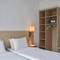 Отель The Apartments By Esperia