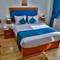 Отель The Palm Hotel