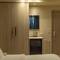 Отель Second Home Hospitality