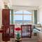 Отель Oyster Bay Beach Suites
