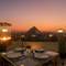 Отель Khan Duidar Inn - Pyramids View Rooftop