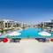 Отель Rixos Premium Magawish Bay View